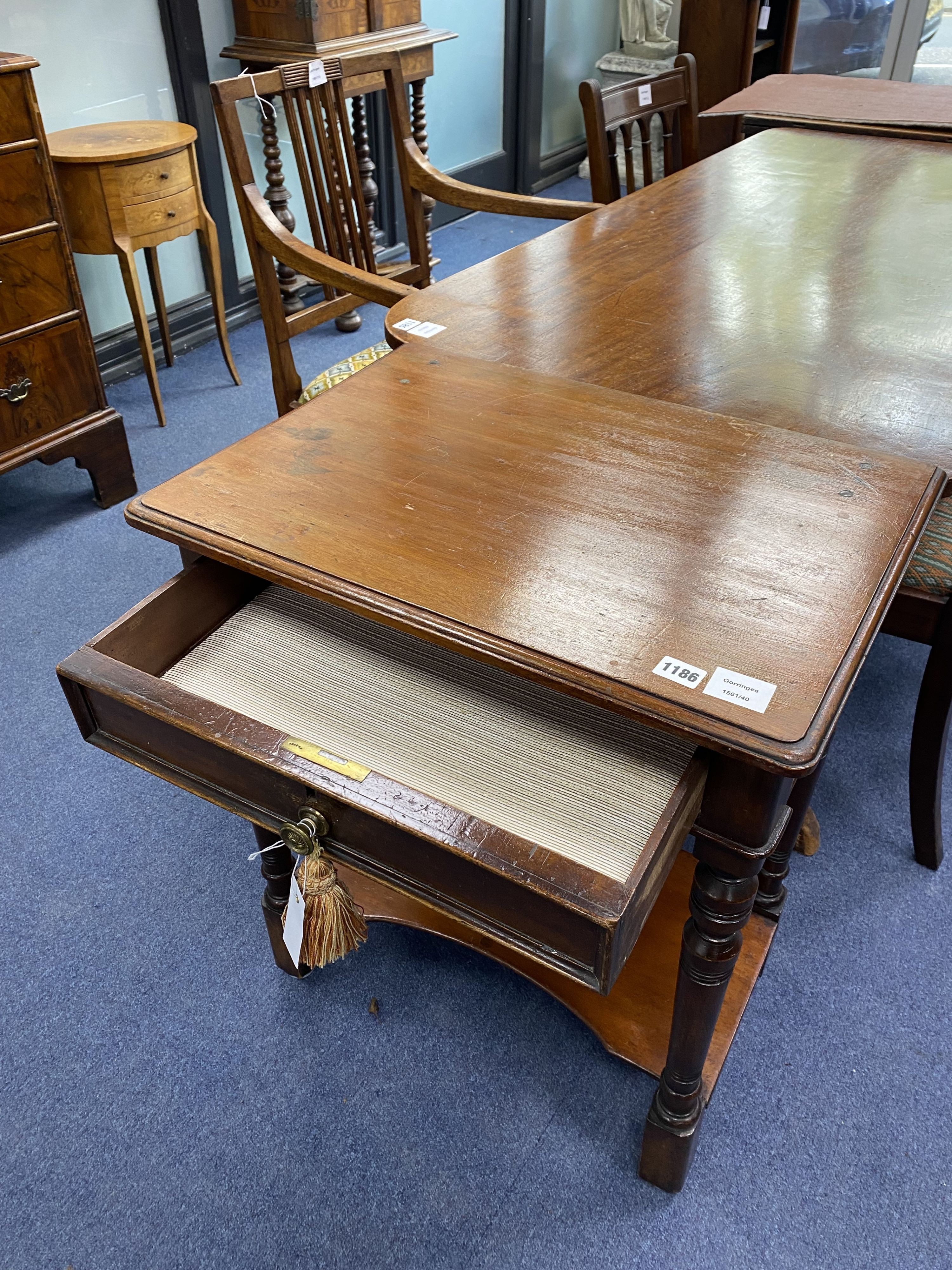 A small Victorian mahogany two tier side table, width 60cm, depth 43cm, height 72cm